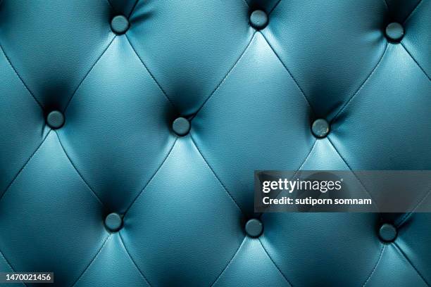 green sofa texture background - headboard stock pictures, royalty-free photos & images