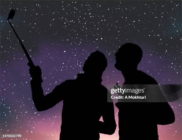 backlight silhouette of two young man in starry sky. - man remembering something stock illustrations