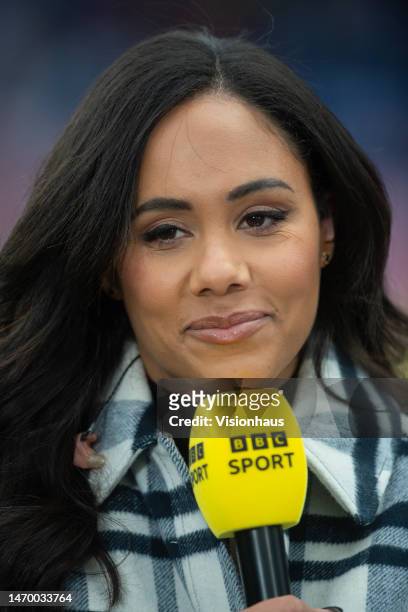 Alex Scott is seen presenting for the BBC prior to the Vitality Women's FA Cup Fifth Round match between Chelsea and Arsenal at Kingsmeadow on...