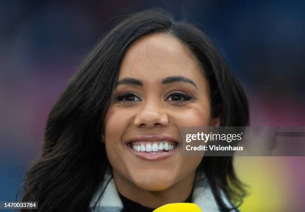 Alex Scott is seen presenting for the BBC prior to the Vitality Women's FA Cup Fifth Round match between Chelsea and Arsenal at Kingsmeadow on...