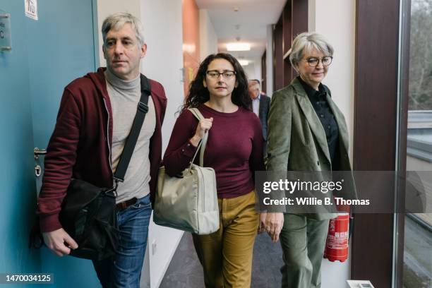 mature students heading to class together - crowded train stock pictures, royalty-free photos & images