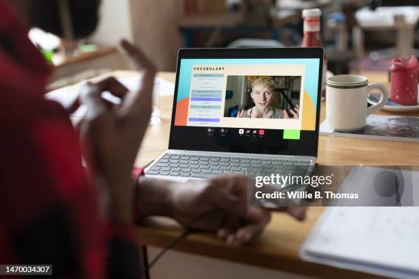 mature student talking to tutor during online class - e learning teacher stock pictures, royalty-free photos & images