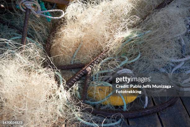 Tangled Fishing Line And Lures Hanging On Power Line Stock Photo