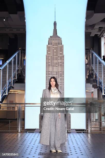 Camila Morrone attends as the cast of Daisy Jones & The Six visits The Empire State Building ahead of its upcoming premiere at The Empire State...
