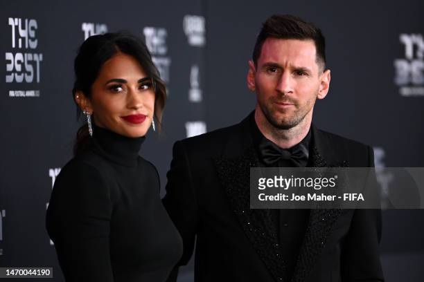Antonela Roccuzzo and Lionel Messi pose for a photo on the Green Carpet ahead of The Best FIFA Football Awards 2022 on February 27, 2023 in Paris,...