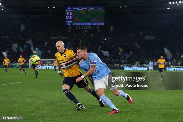 Bram Nuytinck of UC Sampdoria battles for possession with Ciro Immobile of SS Lazio during the Serie A match between SS Lazio and UC Sampdoria at...
