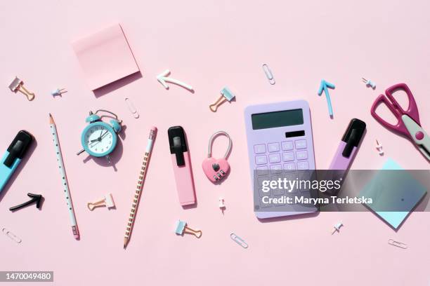 flat lay with pink-violet office. universal stationery office background. stationery background. back to school. university. education. - artículo de papelería fotografías e imágenes de stock