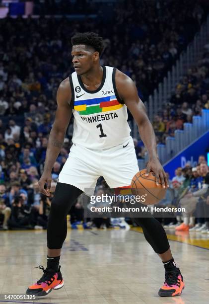 Anthony Edwards of the Minnesota Timberwolves dribbles the ball against the Golden State Warriors during the first quarter of an NBA basketball game...