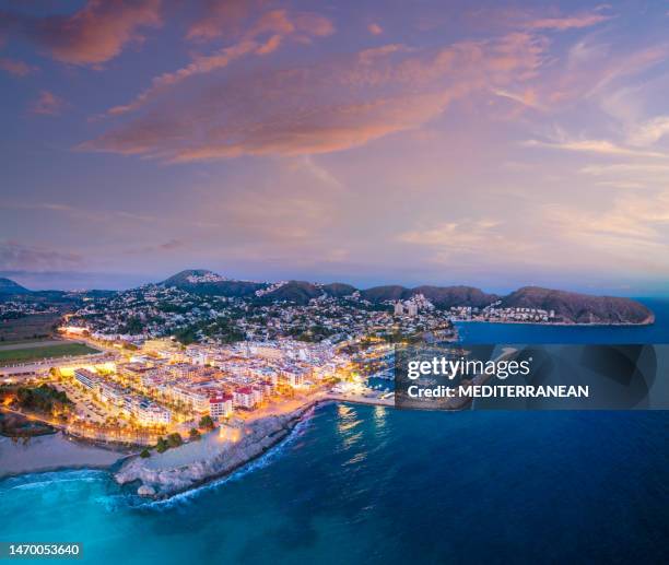 moraira beach at sunset in teulada drone aerial skyline in mediterranean alicante - aircraft point of view stock pictures, royalty-free photos & images