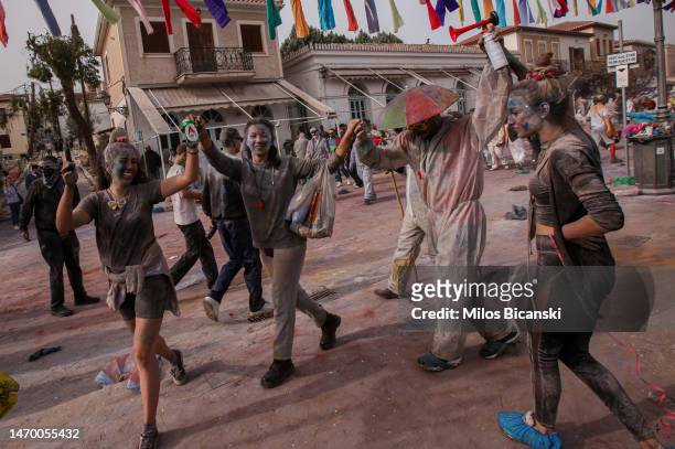 Revellers celebrate Clean Monday with a colourful flour-war on February 27, 2023 in Galaxidi, Greece. Clean Monday, also known as pure Monday, marks...