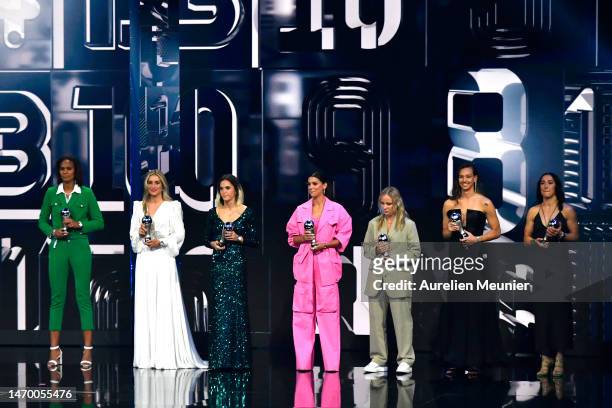 Wendie Renard, Alexia Putellas, Mapi Leon, Alex Morgan, Beth Mead, Christiane Endler and Lucy Bronze are seen with their trophies after being...