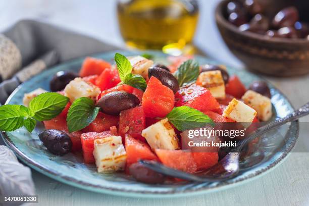 watermelon salad with grilled halloumi cheese - grilled halloumi stock pictures, royalty-free photos & images