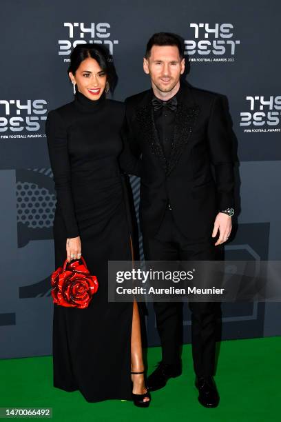 Antonela Roccuzzo and Lionel Messi pose for a photo on the Green Carpet ahead of The Best FIFA Football Awards 2022 on February 27, 2023 in Paris,...