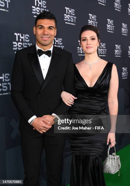 Casemiro and Anna Mariana Casemiro pose for a photo on the Green Carpet ahead of The Best FIFA Football Awards 2022 on February 27, 2023 in Paris,...