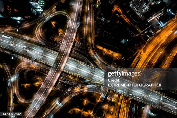 belgrade by night and its highway photographed with a drone directly from above - belgrade skyline imagens e fotografias de stock
