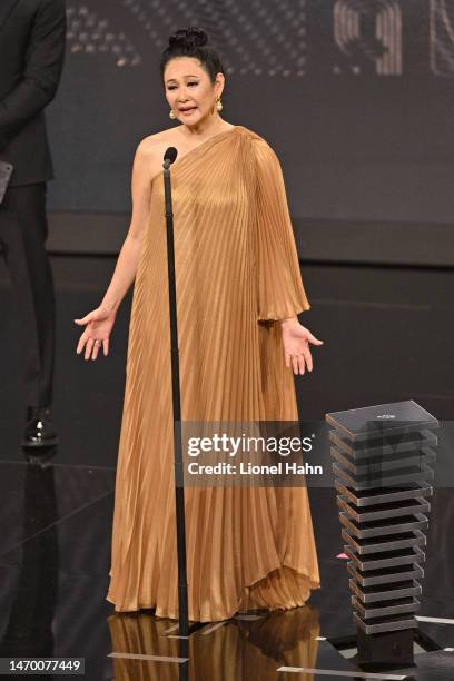 Marcia Aoki, Widow to Pele, is presented with the Best FIFA Award by Ronaldo during The Best FIFA Football Awards 2022 on February 27, 2023 in Paris,...