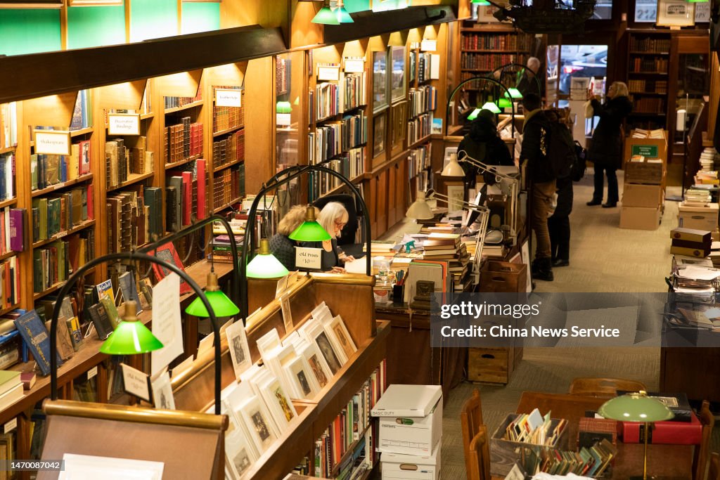 Vooc Store Customers shop for books at the Argosy Book Store, the New York... News ...