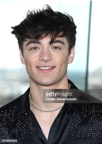 Asher Angel poses at the Photo Call For Warner Bros. "Shazam! Fury Of The Gods" at The London West Hollywood at Beverly Hills on February 27, 2023 in...