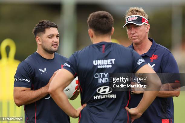 Brandon Smith talks to Roosters head coach Trent Robinson during a Sydney Roosters NRL training session at Kippax Lake on February 28, 2023 in...