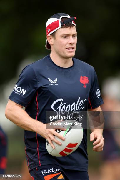 Luke Keary handles the ball during a Sydney Roosters NRL training session at Kippax Lake on February 28, 2023 in Sydney, Australia.