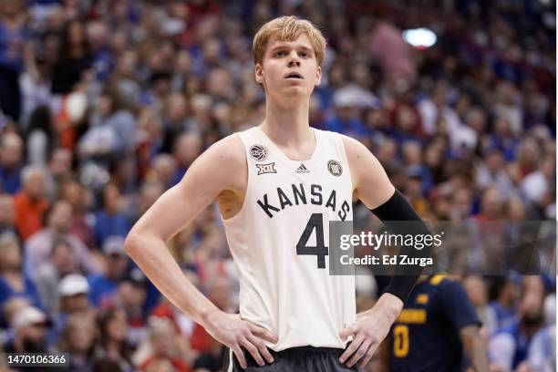 Gradey Dick of the Kansas Jayhawks in action against the West Virginia Mountaineers in the second half at Allen Fieldhouse on February 25, 2023 in...