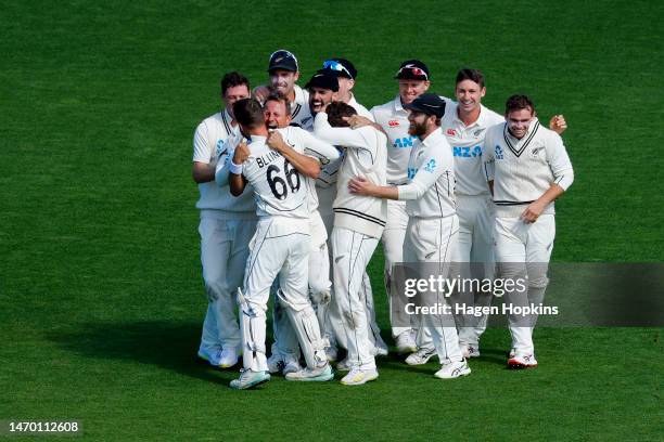 New Zealand players celebrate the win on day five of the Second Test Match between New Zealand and England at Basin Reserve on February 28, 2023 in...