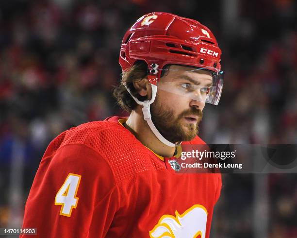 Rasmus Andersson of the Calgary Flames in action against the New York Rangers during an NHL game at Scotiabank Saddledome on February 18, 2023 in...