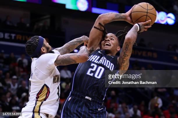 Markelle Fultz of the Orlando Magic shoots against Brandon Ingram of the New Orleans Pelicans during the second half at the Smoothie King Center on...