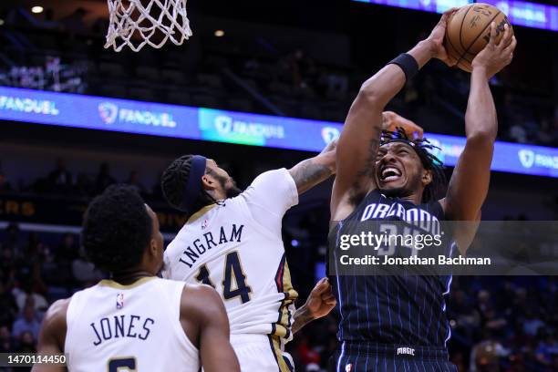 Wendell Carter Jr. #34 of the Orlando Magic shoots against Brandon Ingram of the New Orleans Pelicans during the second half at the Smoothie King...