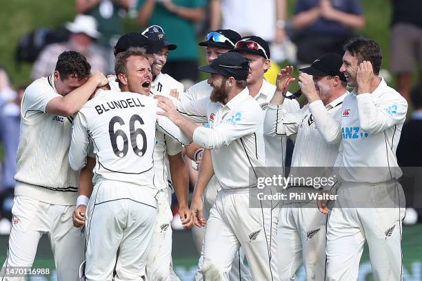 New Zealand celebrate their win on the final wicket during day five of the Second Test Match between New Zealand and England at Basin Reserve on...