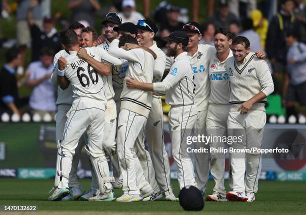 Neil Wagner embraces Tom Blundell after the dismissal of James Anderson as New Zealand won the Second Test Match between New Zealand and England by...