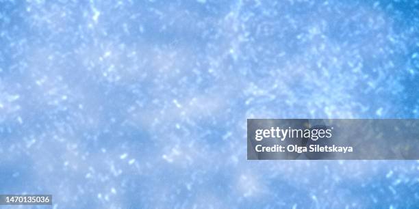 blue abstract textured background with scratches and noise - efecto de película fotografías e imágenes de stock