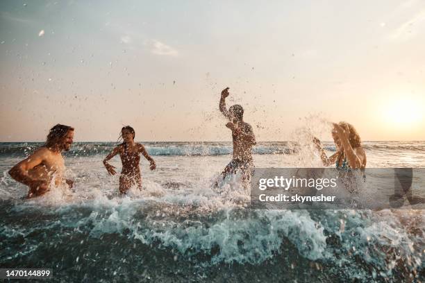 Splashed People 84,474 People Splashed By Water Stock Photos, High-Res Pictures, and ...