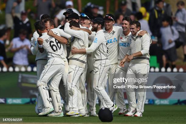 Neil Wagner embraces Tom Blundell after the dismissal of James Anderson as New Zealand won the Second Test Match between New Zealand and England by...