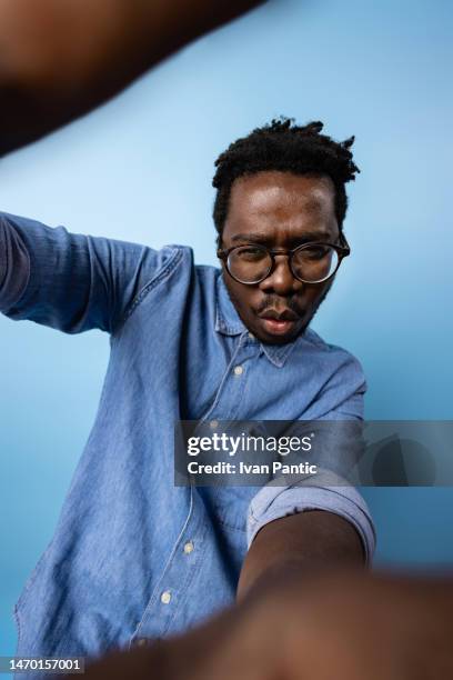 this is going to be a great selfie! - male model selfie stock pictures, royalty-free photos & images