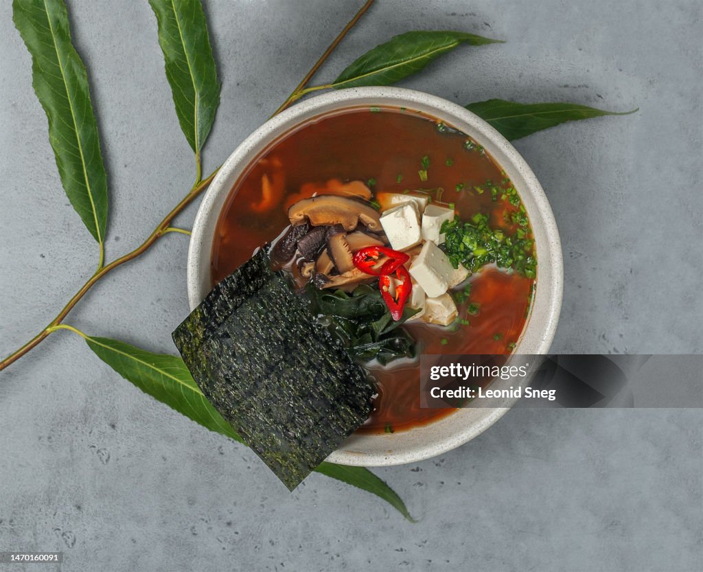 Miso soup on gray background