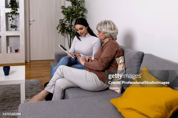 this is useful to know - hands holding tablet a pair of glasses stock pictures, royalty-free photos & images