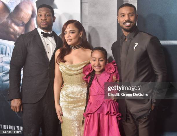 Jonathan Majors, Tessa Thompson, Mila Davis-Kent and Michael B. Jordan attend the Los Angeles Premiere Of "CREED III" at TCL Chinese Theatre on...