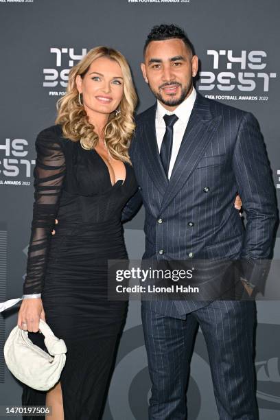 Dimitri Payet and Ludivine Payet pose for a photo on the Green Carpet ahead of The Best FIFA Football Awards 2022 on February 27, 2023 in Paris,...