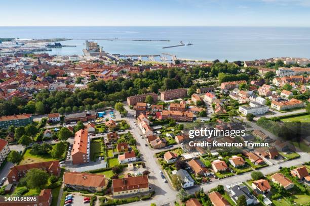 aerial view of a residential area in a city by the sea. - renovación-urbana fotografías e imágenes de stock