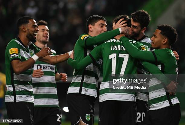 Francisco Trincao of Sporting scores and celebrates a goal with team mates during the Liga Portugal Bwin match between Sporting CP and GD Estoril at...