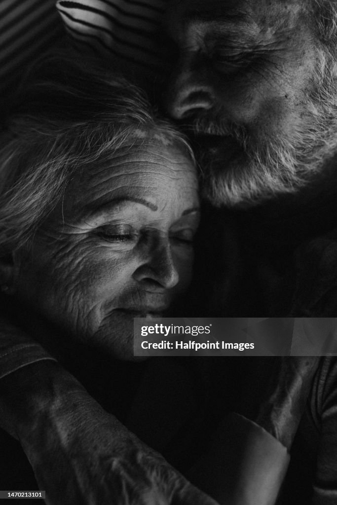 Black and white photo of senior couple in love.