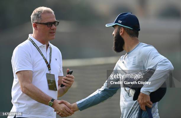 Moeen Ali of England shakes hands with ECB chief executive officer Richard Gould during a net session at Sher-e-Bangla National Cricket Stadium on...