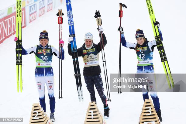 Silver medalist, Frida Karlsson of Sweden, gold medalist, Jessie Diggins of United States and bronze medalist, Ebba Andersson of Sweden celebrate...