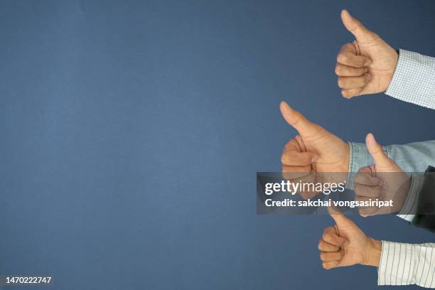 thumb up - giving feedback stock pictures, royalty-free photos & images