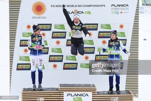 Silver medalist, Frida Karlsson of Sweden, gold medalist, Jessie Diggins of United States and bronze medalist, Ebba Andersson of Sweden celebrate in...