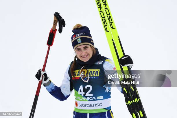 Bronze medalist, Ebba Andersson of Sweden celebrates victory following the Cross-Country Women's 10km Individual Start Free at the FIS Nordic World...