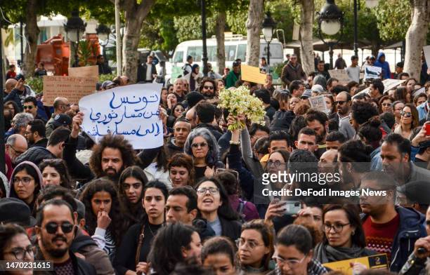 Tunis, Tunisia. 25 February 2023. People holding sings during a demonstration in Tunis to protest against racism and against President Saied latest...