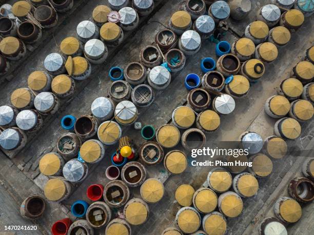 making traditional fish sauce "nuoc mam" - nuoc cham stock pictures, royalty-free photos & images