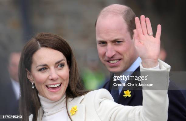 Catherine, Princess of Wales waves as she and Prince William, Prince of Wales depart Aberavon Leisure & Fitness Centre during their visit to Wales on...